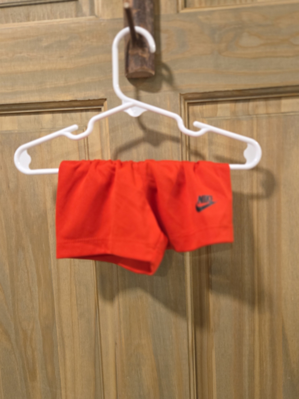Nike Bright Red Kids Athletic Shorts with Black Logo